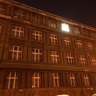 An ink drawing of a barren tree with monkeys in its branches